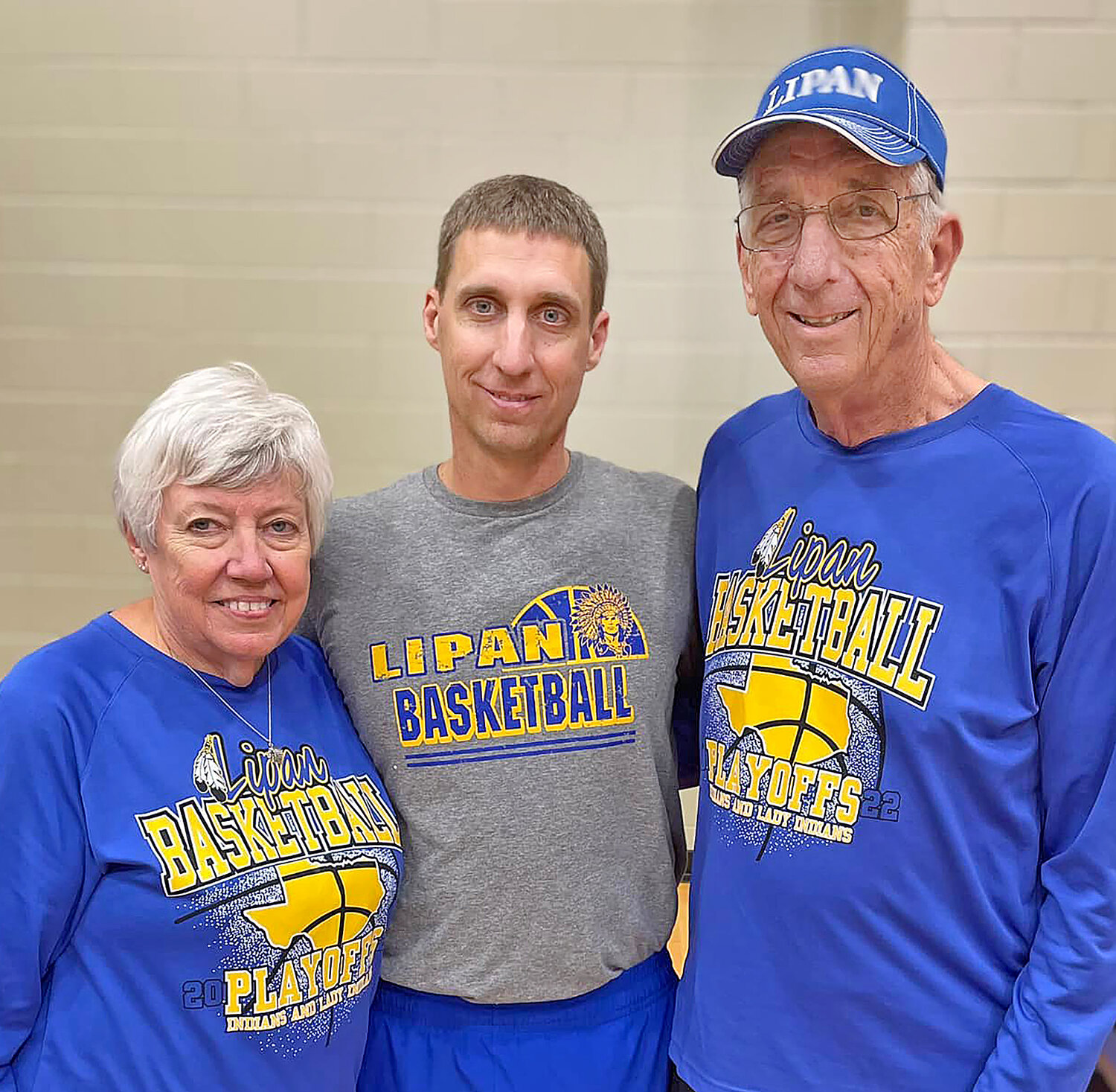 Brent Gaylor, center, has credited his father, Lonnie Gaylor, right, for the success he has enjoyed as a coach. Brent's mom, Myra, is pictured at left. Lonnie Gaylor, whose Graham High School boys team featured Brent as a starting guard and reached the 1996 Class 3A state championship game, was voted into the Texas Association of Basketball Coaches Hall of Fame in 2016.