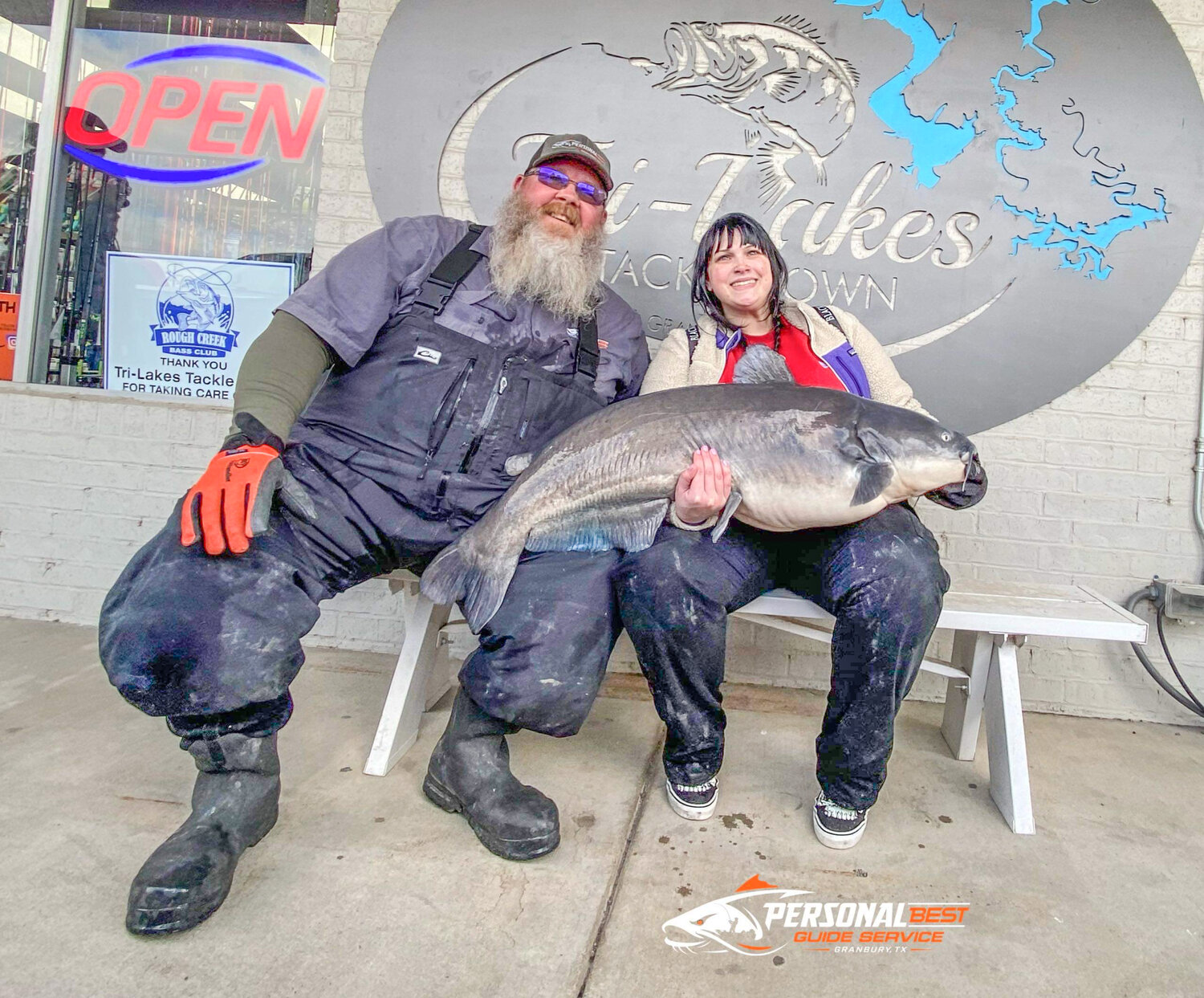 A potentially new Lake Granbury record blue catfish (56.56 pounds) was caught by Laura Katelyn Shepherd, right, while fishing with Mike Watkins, left, of Personal Best Guide Service.
