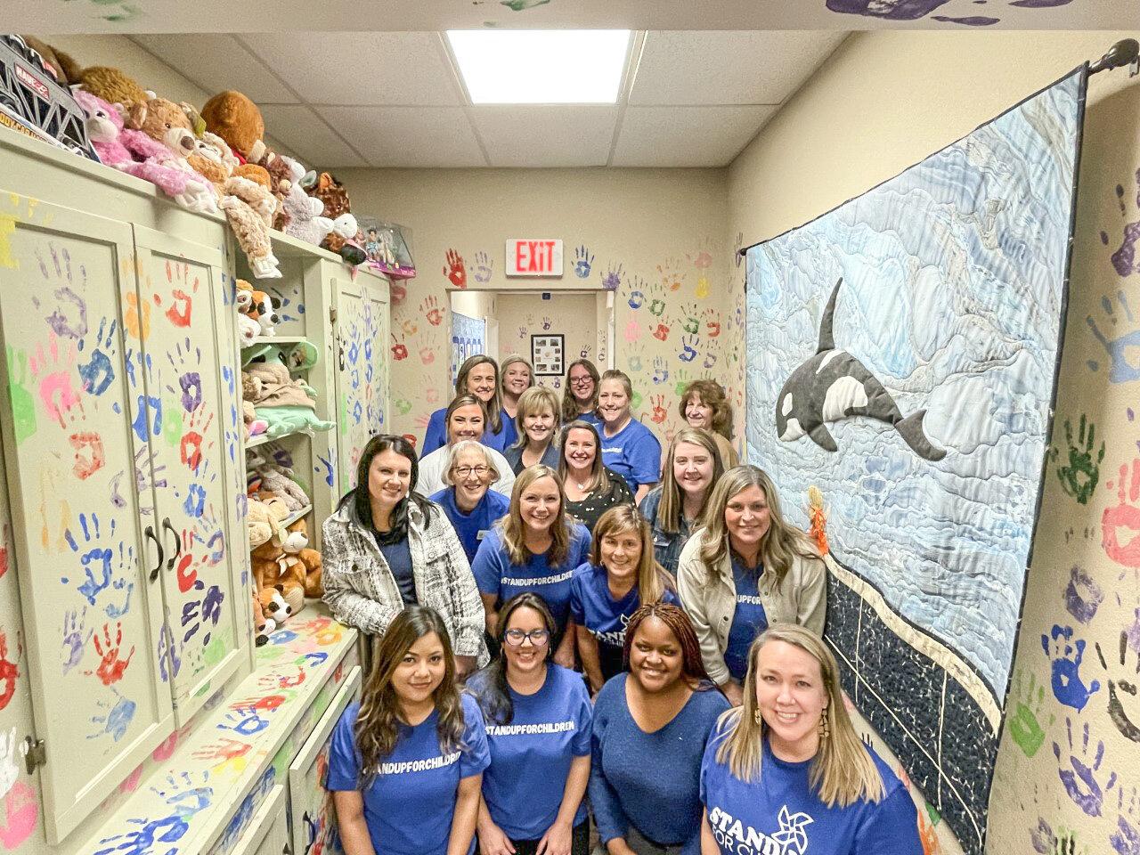 Staff members of the Paluxy River Children’s Advocacy Center wear blue on Jan. 11, in recognition of National Human Trafficking Awareness Day.
