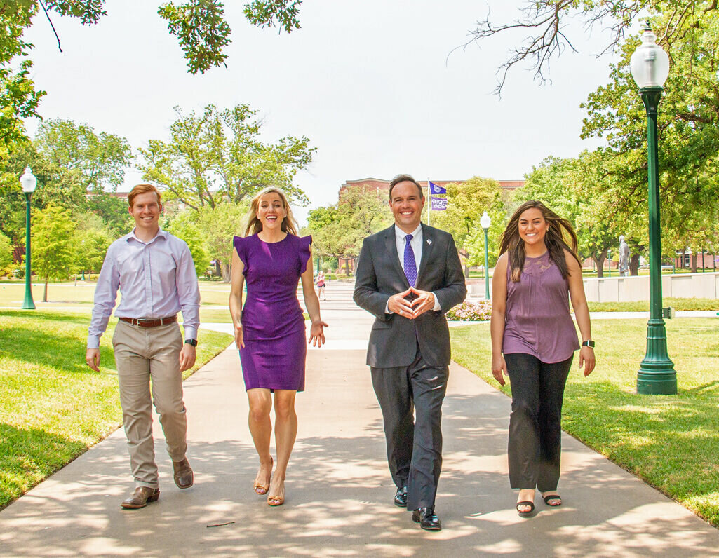 AMBASSADORS: Tarleton First Lady Kindall Hurley and President James Hurley flanked by student ambassadors Kahlen Cheatham (left) and Stephanie Council (right) play vital roles.