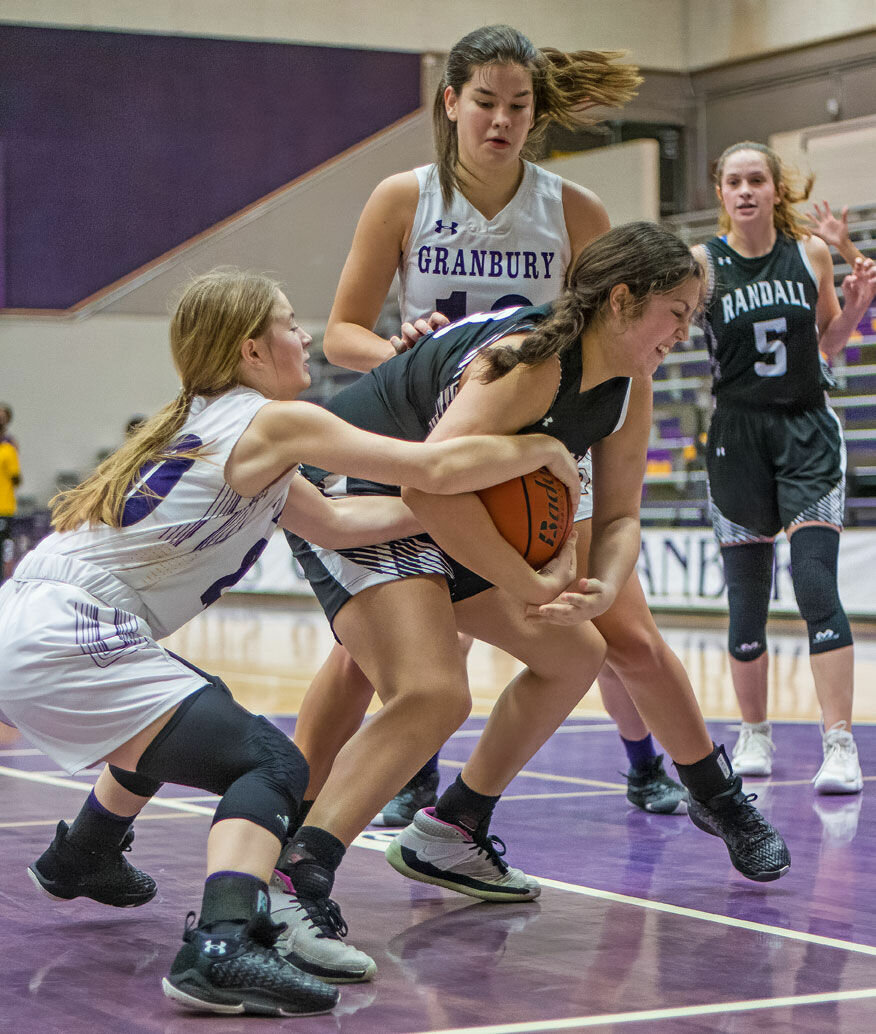 GRAB IT: Alexa Mueller likes to make sure that possession of the basketball is always contested.