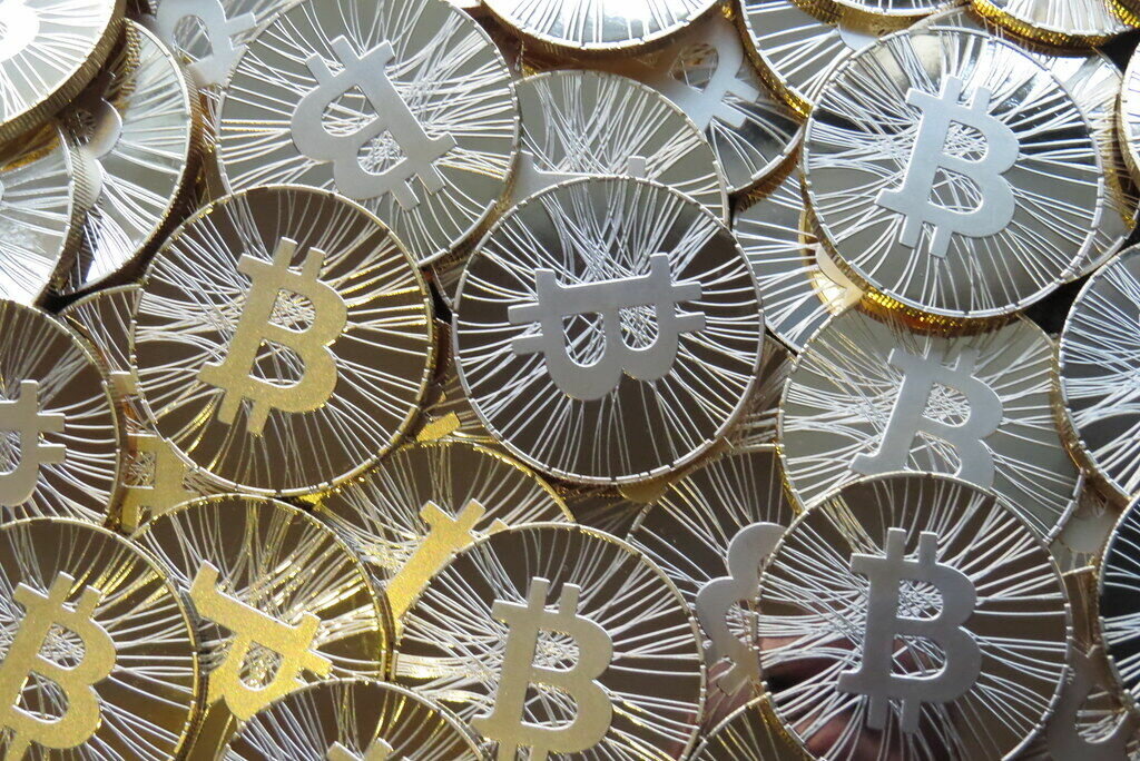 "Bitcoin, bitcoin coin, physical bitcoin, bitcoin photo" by antanacoins is licensed under CC BY-SA 2.0