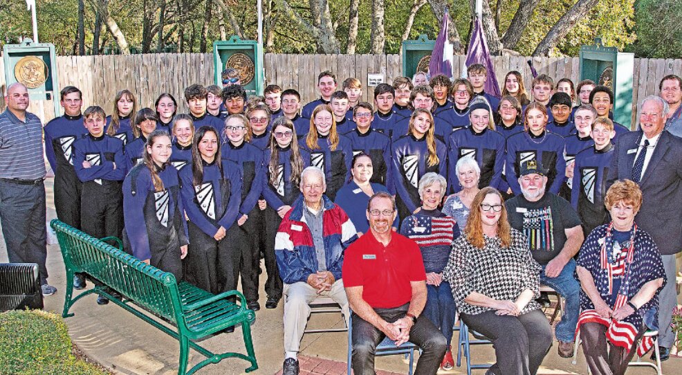 COMMUNITY EFFORT: The Tolar High School Rattler Band was at Memorial Lane in Granbury recently where the commemorative coins were unveiled. "This is really about community more than anything, because it took Friends of Memorial Lane, Visit Granbury and the Tolar Rattler Band to make it all happen," Julia Pannell said. 