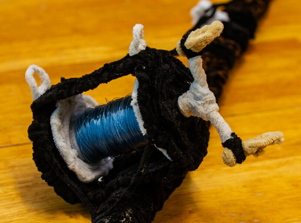 PIPE CLEANERS: This entire working fishing reel is made from pipe cleaners -- including the gears. 