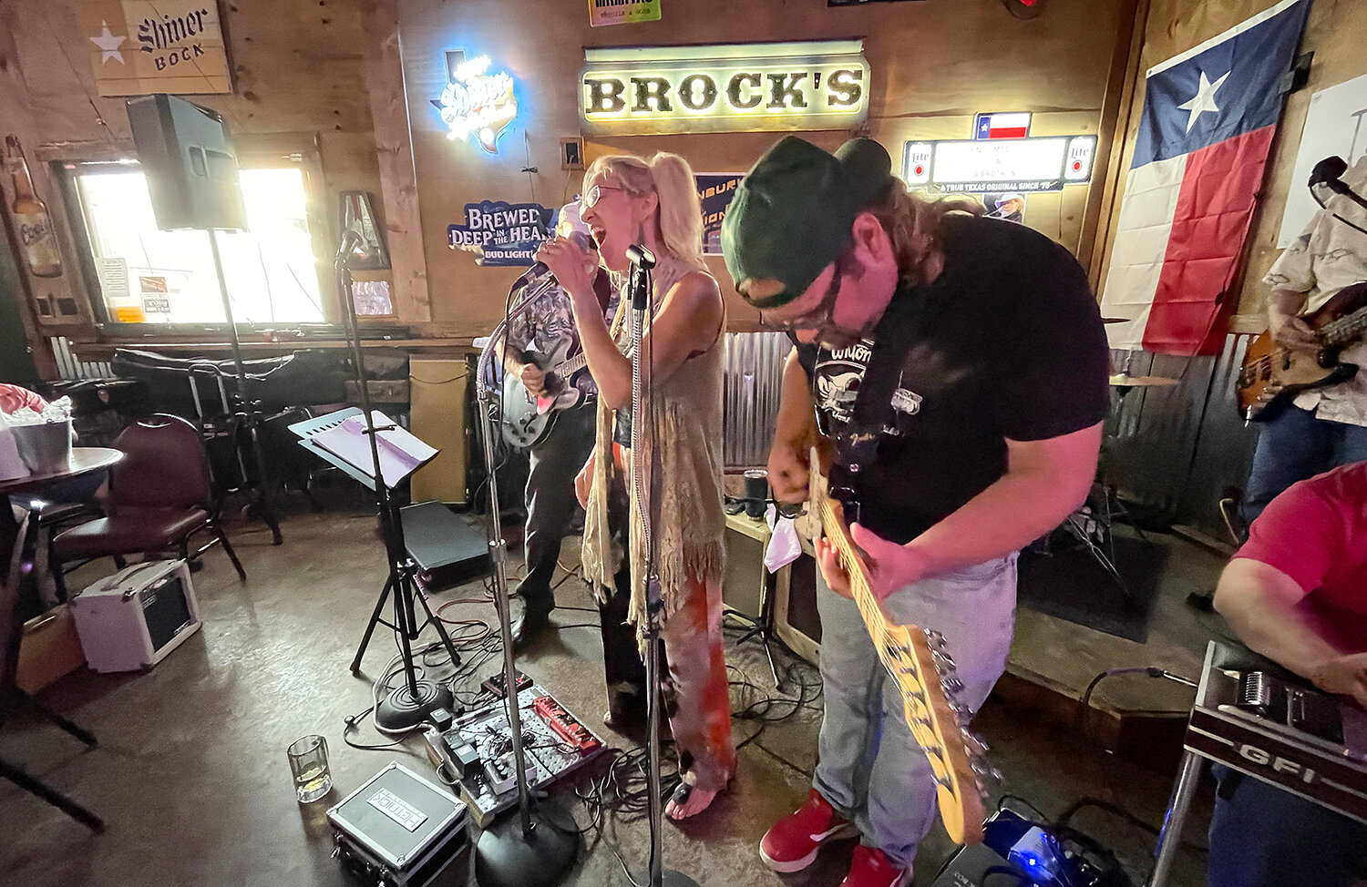 Lizz Schelhorn belts out rock classics at a jam session inside Brock's Food and Drink in Acton. 