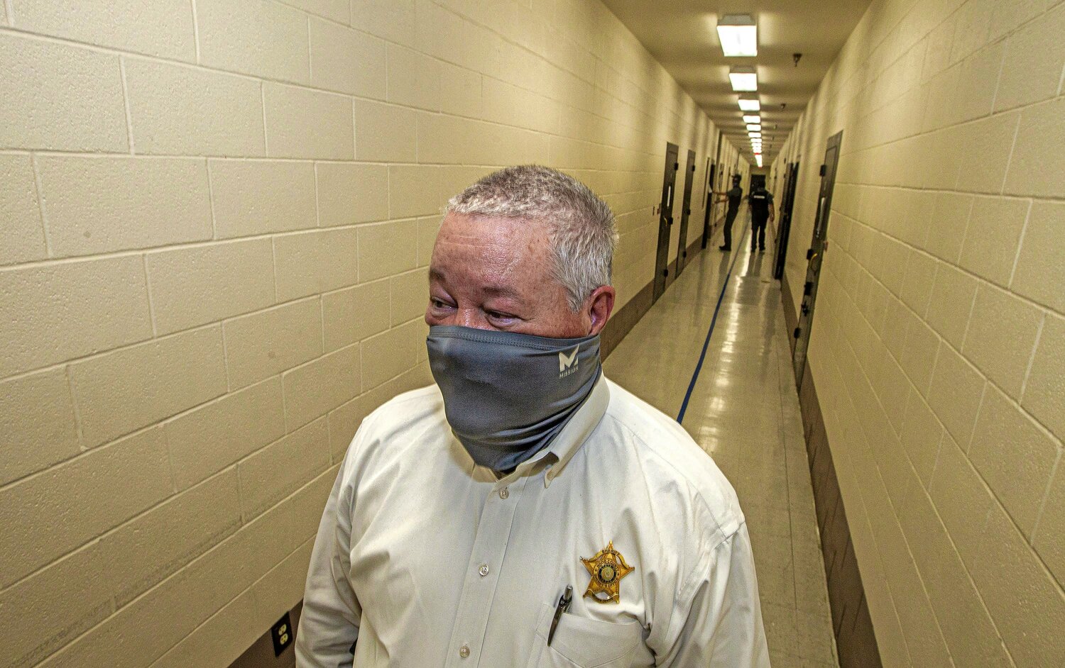 Hood County Sheriff Roger Deeds standing in one of the corridors of the menÕs wing inside the Hood County Jail while detention officers make their rounds. Photo taken inside the Hood County Jail Wednesday, Sept. 16, 2020.
