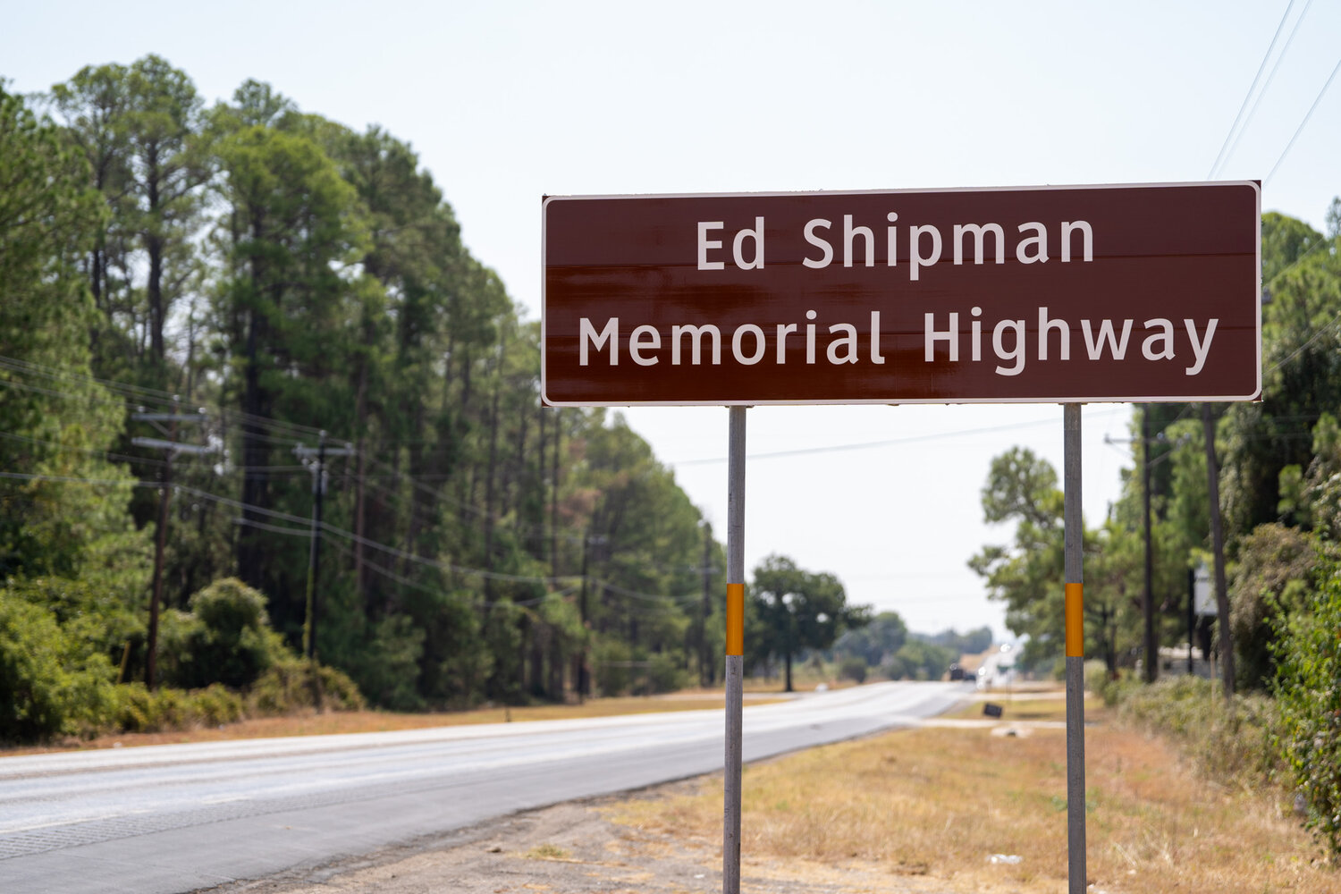 The six-mile stretch of highway in front of Happy Hill Farm on State Highway 144 was celebrated after being named in honor of Ed Shipman as part of Ed Shipman Tribute Day.
