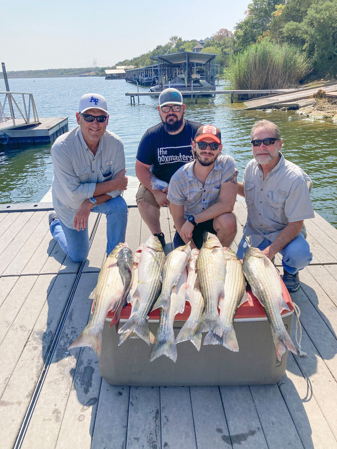 Pictured from left to right is Jim Rowland, Issac Rodriquez, Jonathan Hoogendoorn and John Hoogendoorn. Mr. Hoogendoorn is a Pecan Plantation resident and these folks enjoyed catching some big Granbury Striped bass this last weekend.