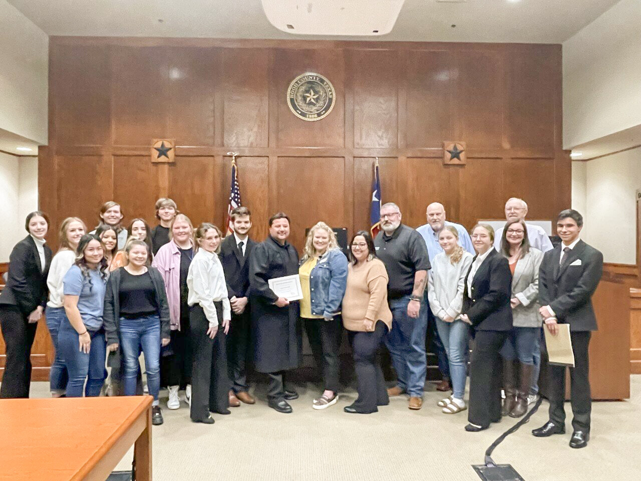Granbury High School debate students volunteering as defense and prosecutor attorneys for Hood County Teen Court pose for a photo last year after former Hood County Justice of the Peace for Precinct #2 Martin Castillo presided over his last court cases in December.