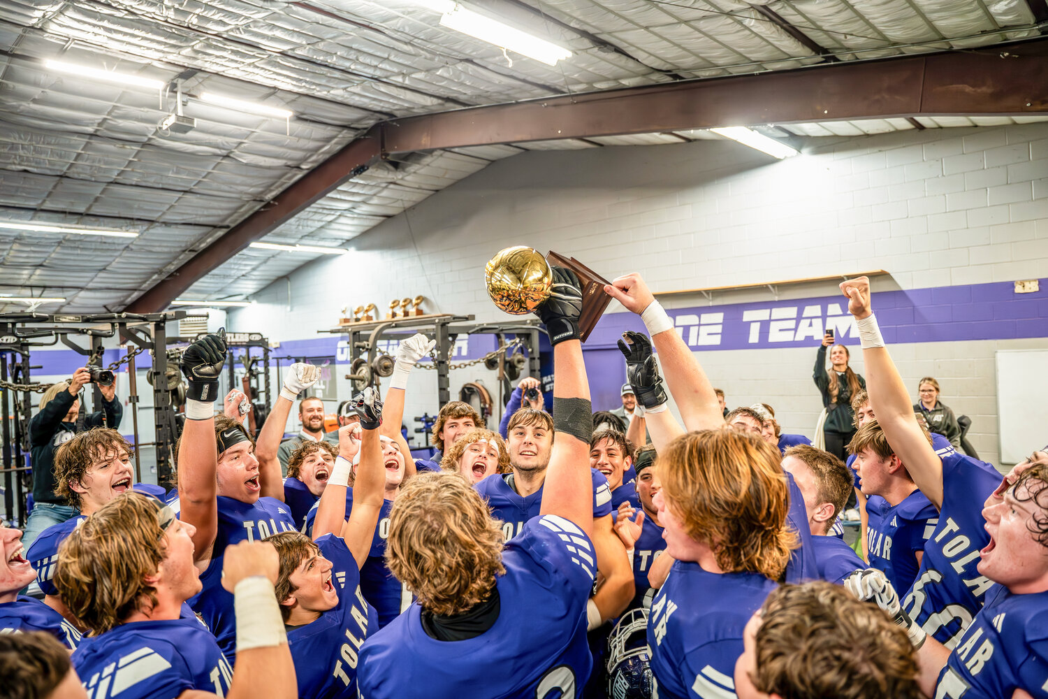 Tolar Rattlers receive, the District  Championship trophy after defeating San Saba  Nov. 3