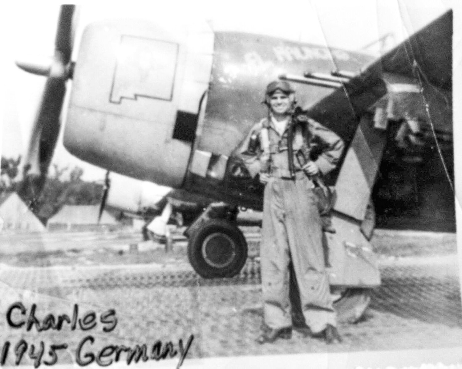 Charles Baldwin is pictured in front of an airplane in Germany in 1945.