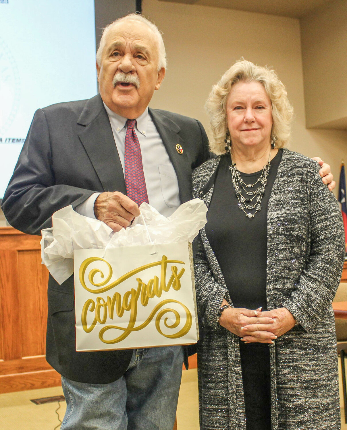 Former Hood County Auditor Rebecca (Becky) Kidd, right, poses with Hood County Judge Ron Massingill following the announcement of her retirement last December.