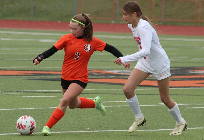 Kirksville junior Madison Albright looks to send the ball upfield in the game against Mexico on March 27. 