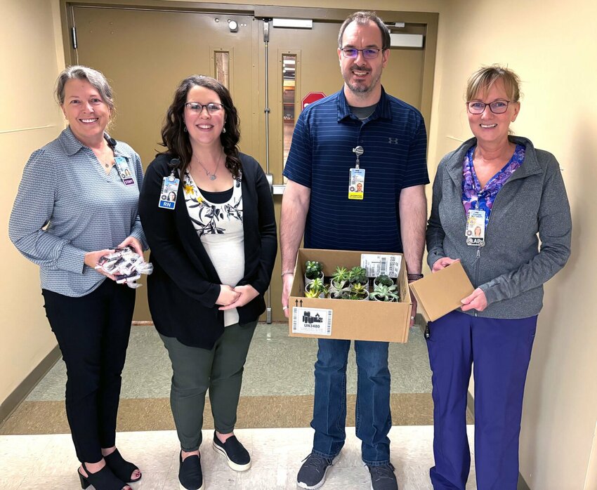 Scotland County Hospital and Clinics is celebrating National Patient Experience Week from April 29- May 3. Members of the Patient Experience Committee delivered gifts to patients in the hospital. Left to right: Tara Shultz, Cheyenne Neagle, Jonathan Holton (Patient Experience Committee Chairman) and Charlotte Stelter