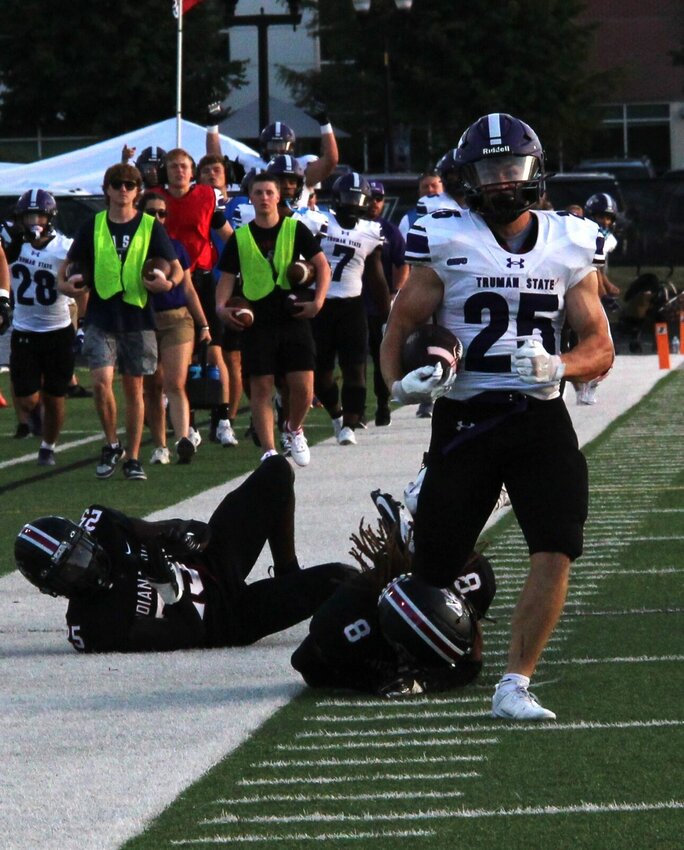 Senior return man Jack Butchko finishes off his 96-yard kickoff return for a touchdown in the first half of Saturday's loss in Indianapolis at Key Stadium.