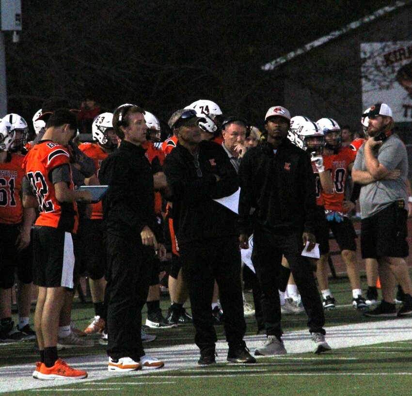 The Tiger coaches discuss in a game against Chillicothe at home two weeks ago, Sept. 2.