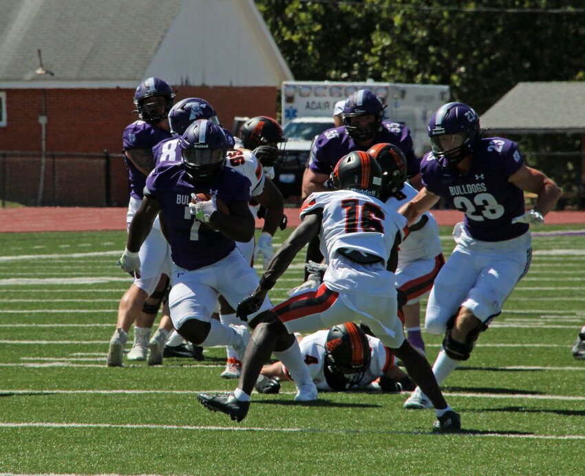 Bulldog running back Denim Cook busts loose for yardage in the Bulldogs' 37-21 loss to Findlay on Sept. 7.