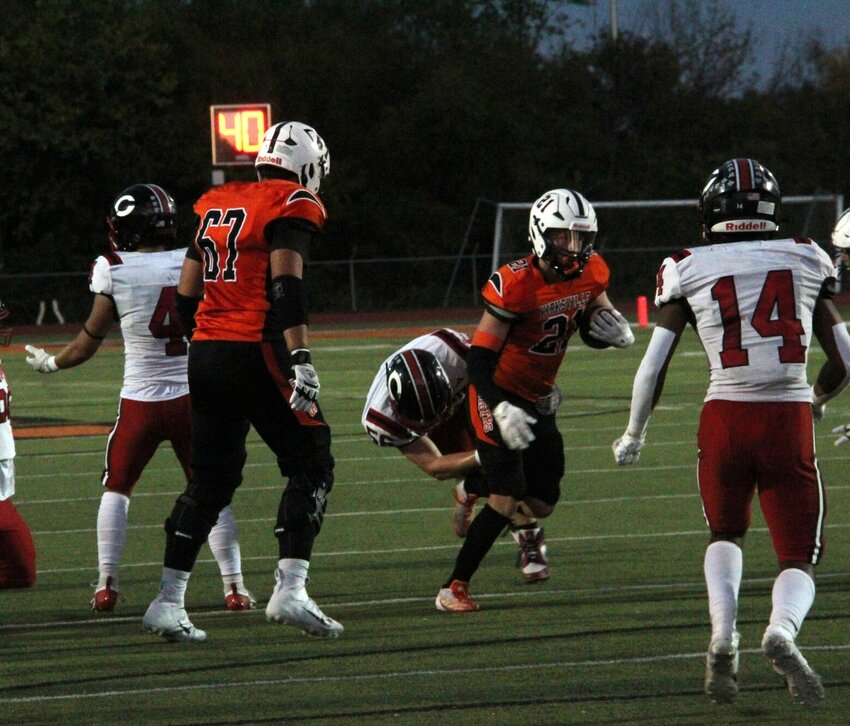 Senior back Jace Kent breaks a tackle in a matchup against Chillicothe earlier in the year. Kent finished with 153 yards and four touchdowns in Kirksville's predictable rout of a struggling Marshall team.