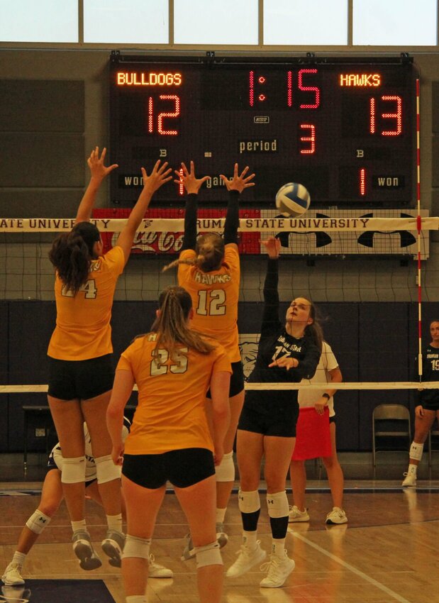 Jessica Proszenyak sneaks a ball past Quincy front in a game on Oct. 5.