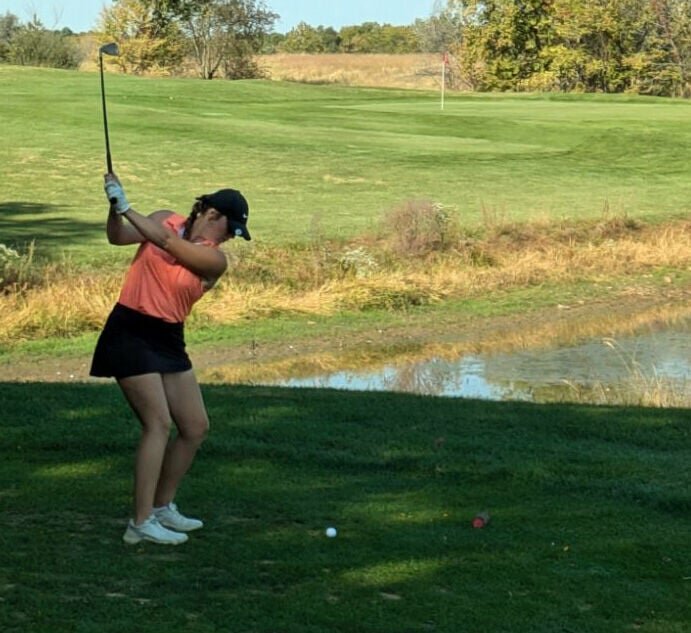 Kirksville senior Addy Davis looks to lift it across the water on Friday. Davis finished second in the Class 3 District 2 tournament with an 81-stroke round to advance to the State meet next week.