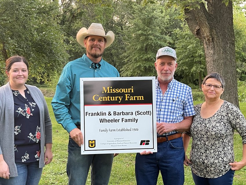 Pictured left to right: Brittany Bailey, extension council chair; Zac Erwin, MU Extension field specialist in livestock, Franklin Wheeler, Barbara (Scott) Wheeler.