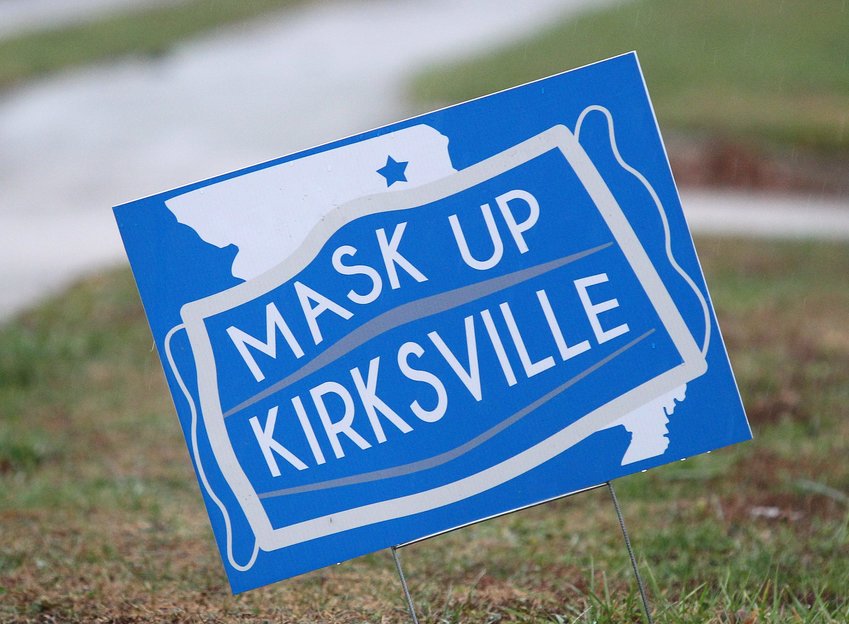 A &amp;quot;Mask Up Kirksville&amp;quot; sign sits along Baltimore Street in Kirksville.