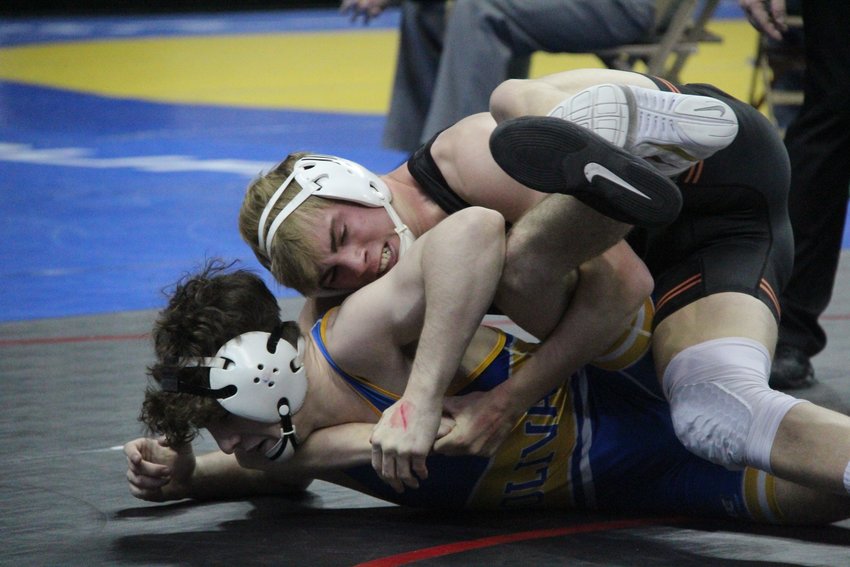 Kirksville's Logan Blickhan holds control of an opponent during the 2020 state wrestling tournament.