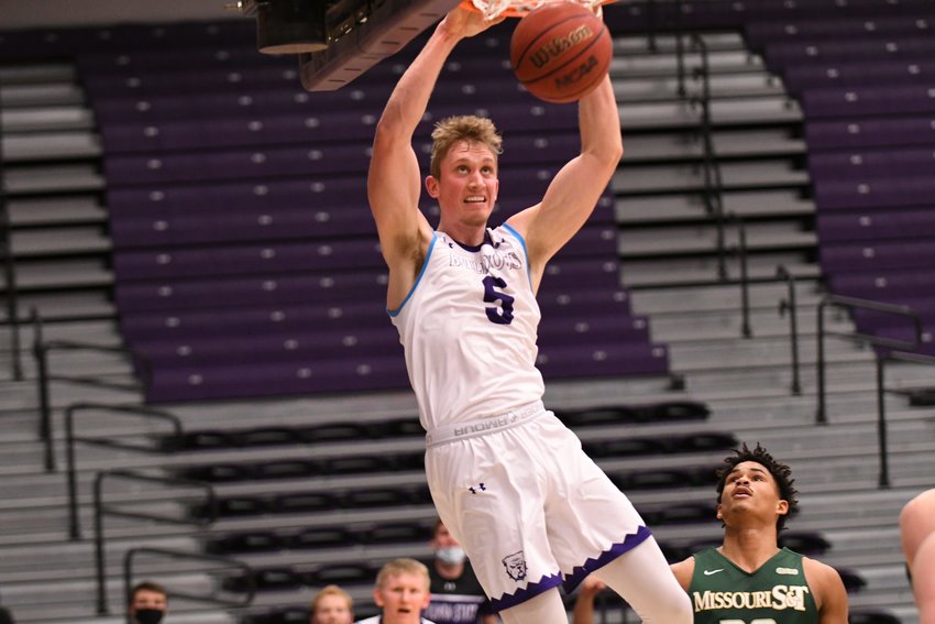 Truman's Alex McQuinn throws down a dunk during the second half of Thursday's game against Missouri S&amp;amp;T.