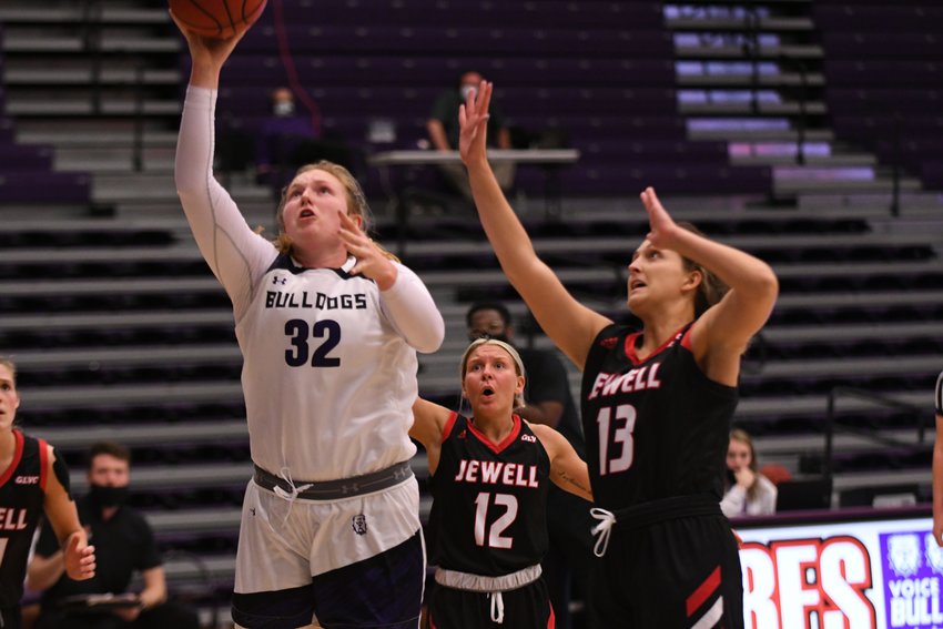 Truman forward Ellie Weltha puts up a shot at the basket Wednesday against William Jewell.