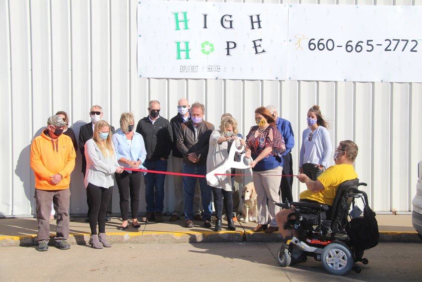 Staff members of High Hope Employment Services cut a ribbon during a ceremony to celebrate the company's new building in Kirksville.