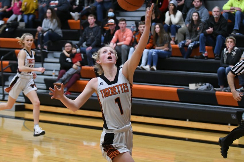 Action from Tuesday's meeting between the Macon and Milan girls basketball teams.