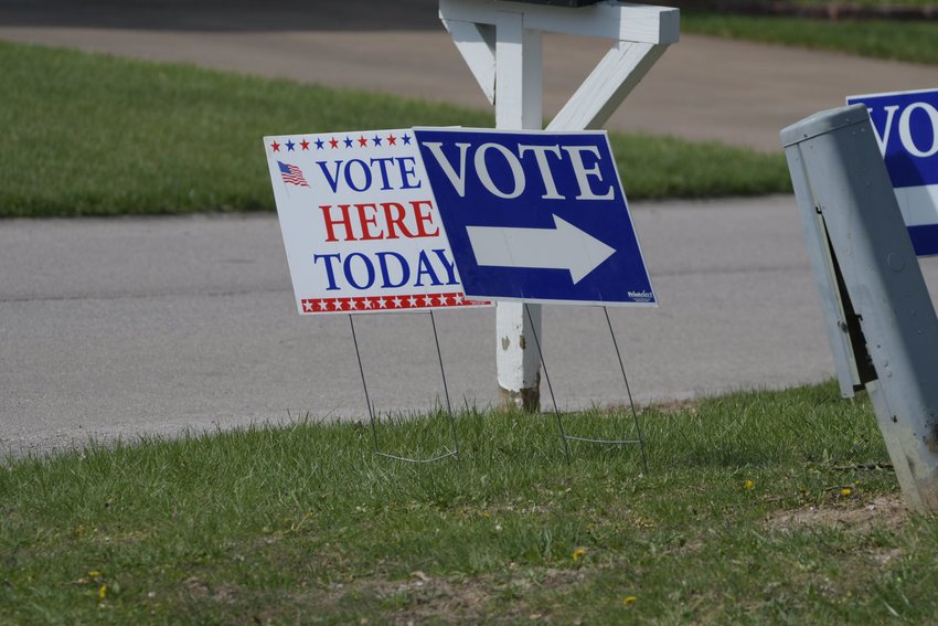 Daily Express photo of voting signs in Kirksville.