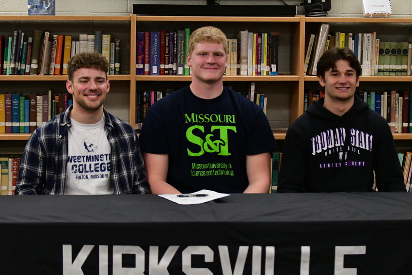 Kirksville's Landon Yardley, Owen Fraser and Jaden Ballinger pose after a college signing ceremony on Thursday, March 31, 2022.