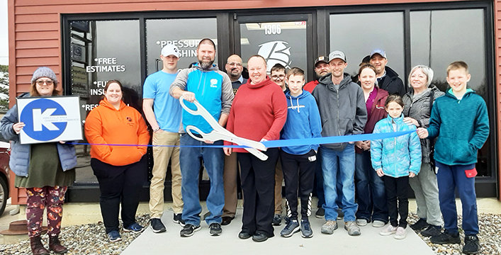 Pictured left to right, as faces appear in the ribbon cutting photo are: Kelly Jones, Kirksville Area Chamber of Commerce; Tiffany Ellis, Isaiah Bailey, Chris Bailey, owner Bailey&rsquo;s Window Cleaning; Patrick Nolan, Nolan, Mulford &amp; Deleeuw, LLC; Denise Bailey, Bailey&rsquo;s Window Cleaning; Cormac Nolan, Logan Bailey, Stewart Bunch, Justin Brookhart, Carrie Miller, Colton&rsquo;s Steak House &amp; Grill, Daryle Newsome, Leilani Newsome, Amber Lupton, and Liam Newsome.