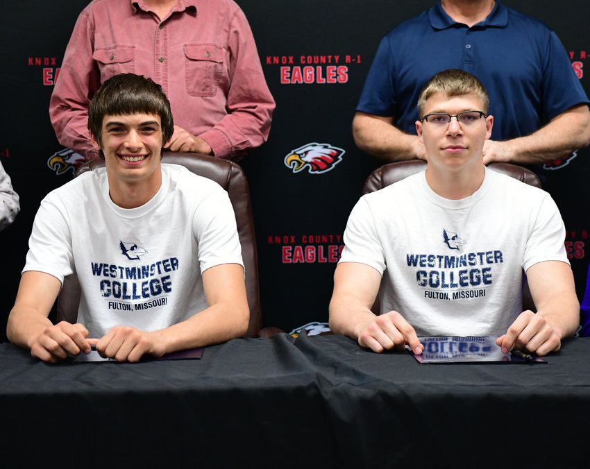 Knox County's Jacob Becker, left, and Tanner Gillaspy pose after signing their NLIs Tuesday for the Westminster College men's basketball team.