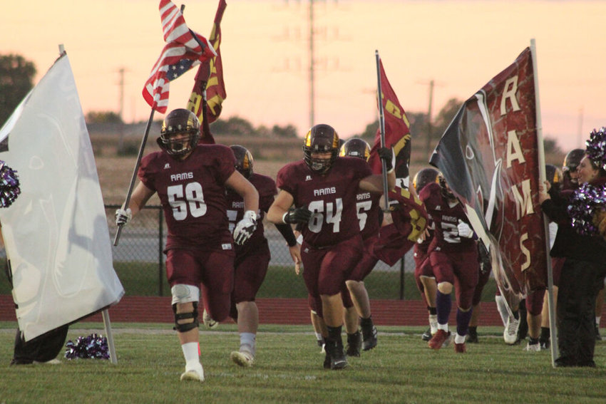 The Schuyler County football team runs onto the field prior to the game against King City on Oct. 7.&nbsp;