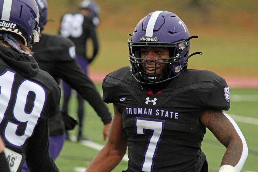 Truman running back Shamar Griffith heads back to the sideline after scoring a touchdown against McKendree on Nov. 5.&nbsp;