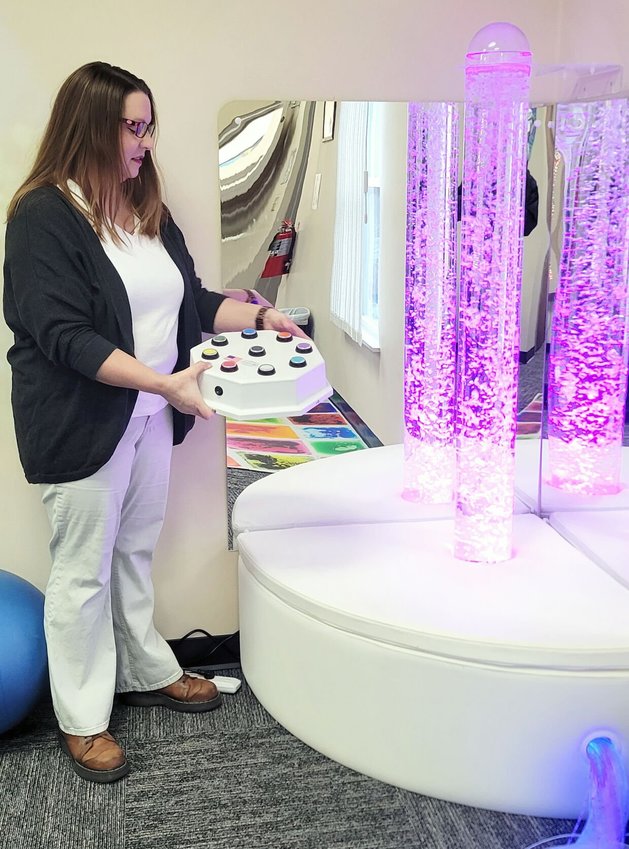 Adair County SB40 Community Engagement Specialist&nbsp;Melissa Cline shows off the features of the organizations new sensory room.&nbsp;