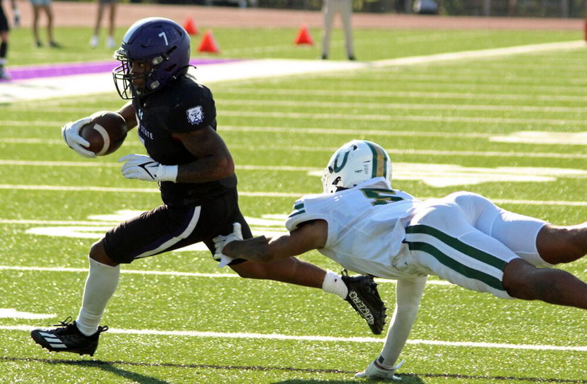 Truman State running back Shamar Griffith runs by a defender against Tiffin on Sept. 24.&nbsp;