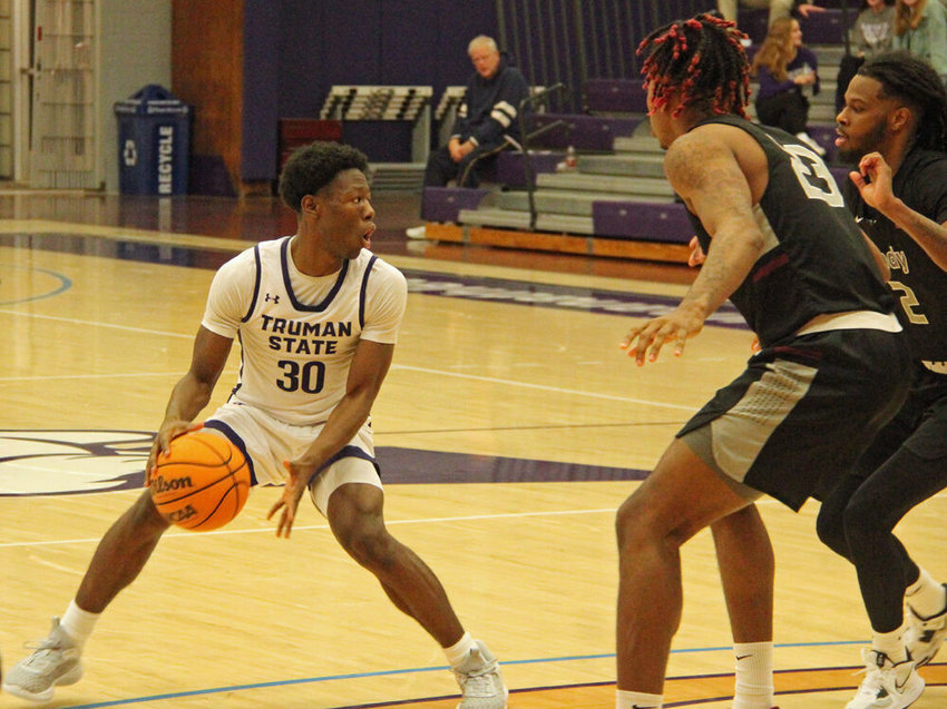 Truman guard Xavier Hall handles the ball on offense against Indianapolis on Nov. 28.&nbsp;