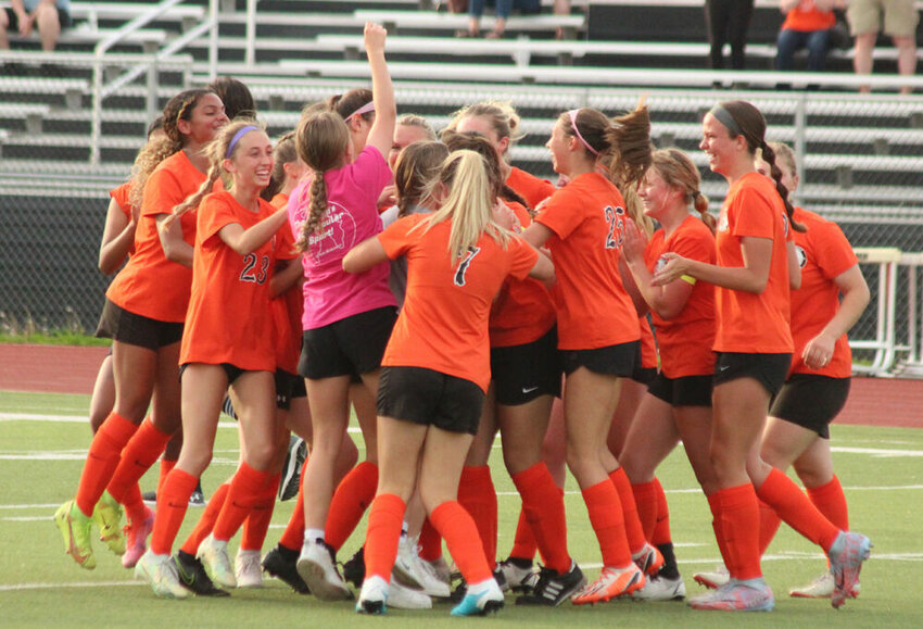 The Kirksville girls soccer team celebrates after sophomore Zoe Cole's game-winning goal in overtime against Battle on May 10.&nbsp;