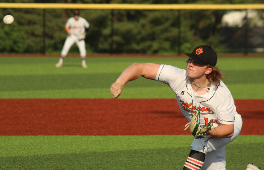 Macon senior Hayden Burns delivers a pitch in the sectional game against Fulton on May 23.&nbsp;