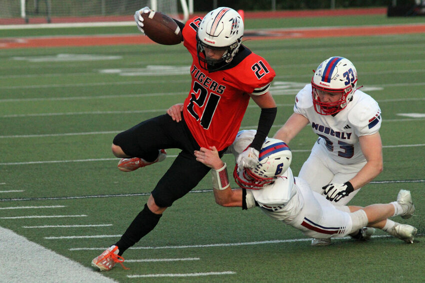 Kirksville running back Jace Kent gets forced out of bounds by a Moberly defender in the game on Sept. 15.&nbsp;