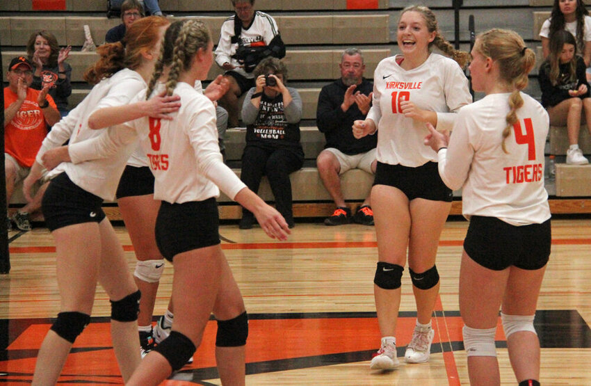 The Kirksville volleyball team celebrates a point in the third set against Marshall in the match on Sept. 28.&nbsp;