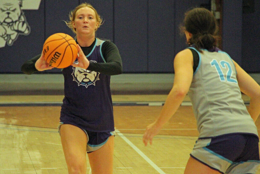 Truman guard Ainsley Tolson makes a pass to the corner during a drill in practice on Oct. 6.&nbsp;
