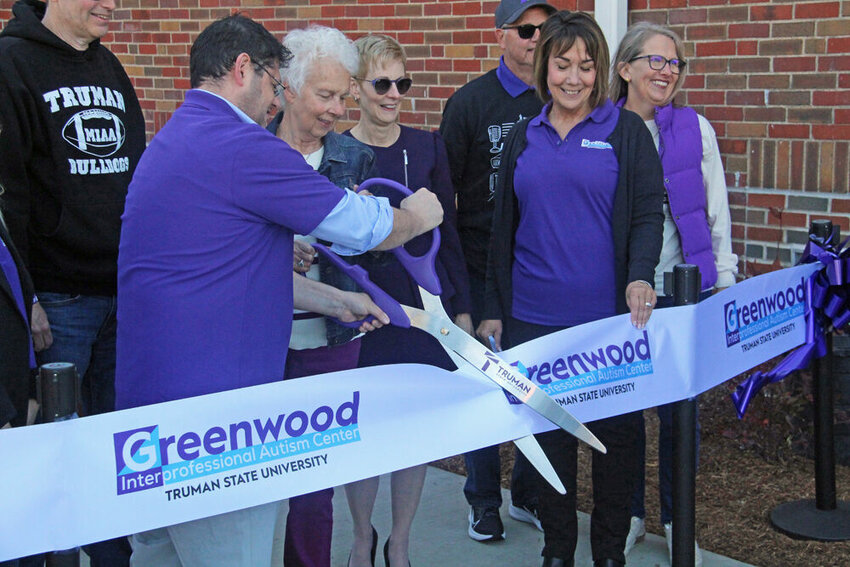 The ribbon is cut during a ceremony held at the Greenwood Interprofessional Autism Center on Oct. 21. The center will start seeing clients later this fall.&nbsp;