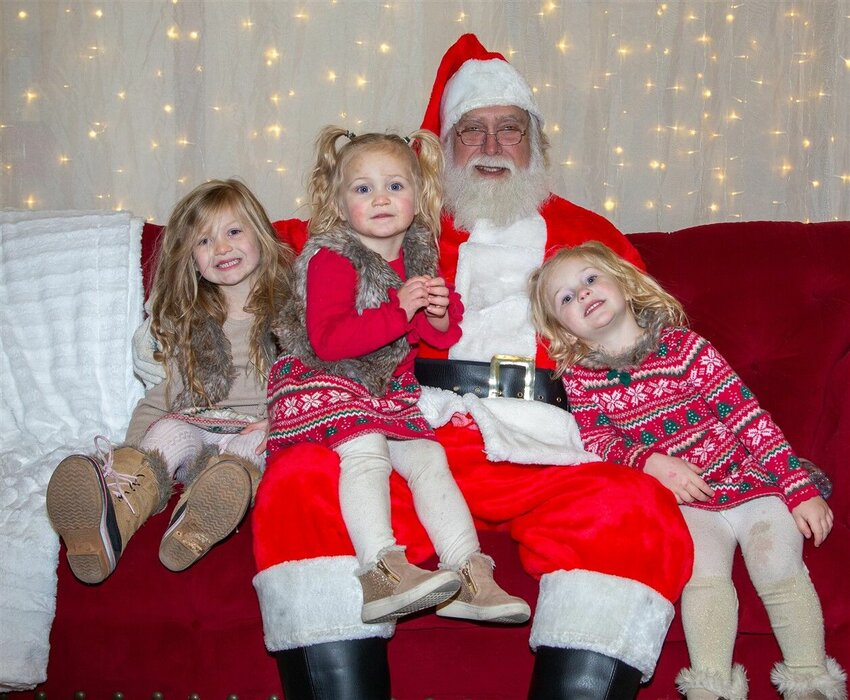 Kids enjoy some time with Santa at the Kirksville Hometown Holiday event held on Nov. 25 at the downtown square.&nbsp;