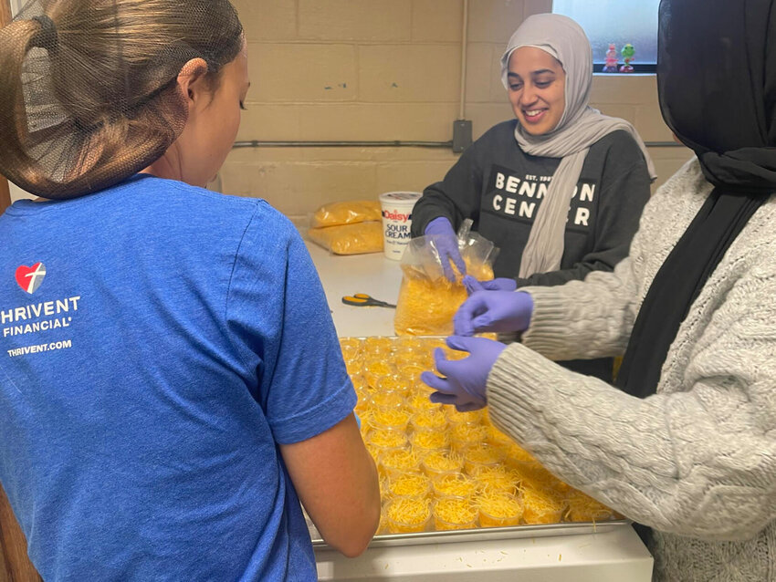 Volunteers from A.T. Still University prepare meals to be distributed in the community.&nbsp;