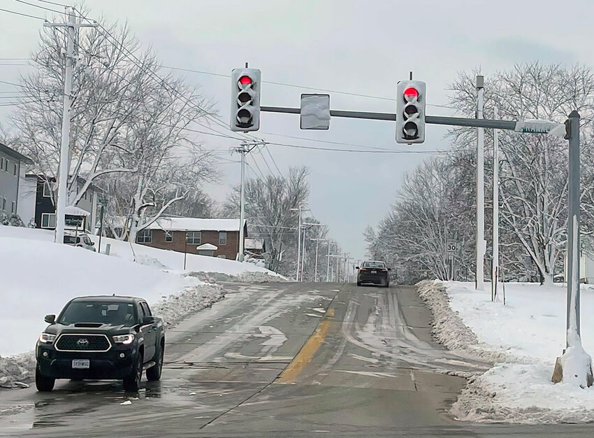 Traffic lights and street signs throughout Kirksville were covered with snow.&nbsp;