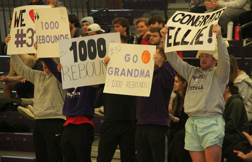 Fans in the Truman student section celebrate forward Ellie Weltha's 1,000th career rebound in the game against Drury on Jan. 20.&nbsp;